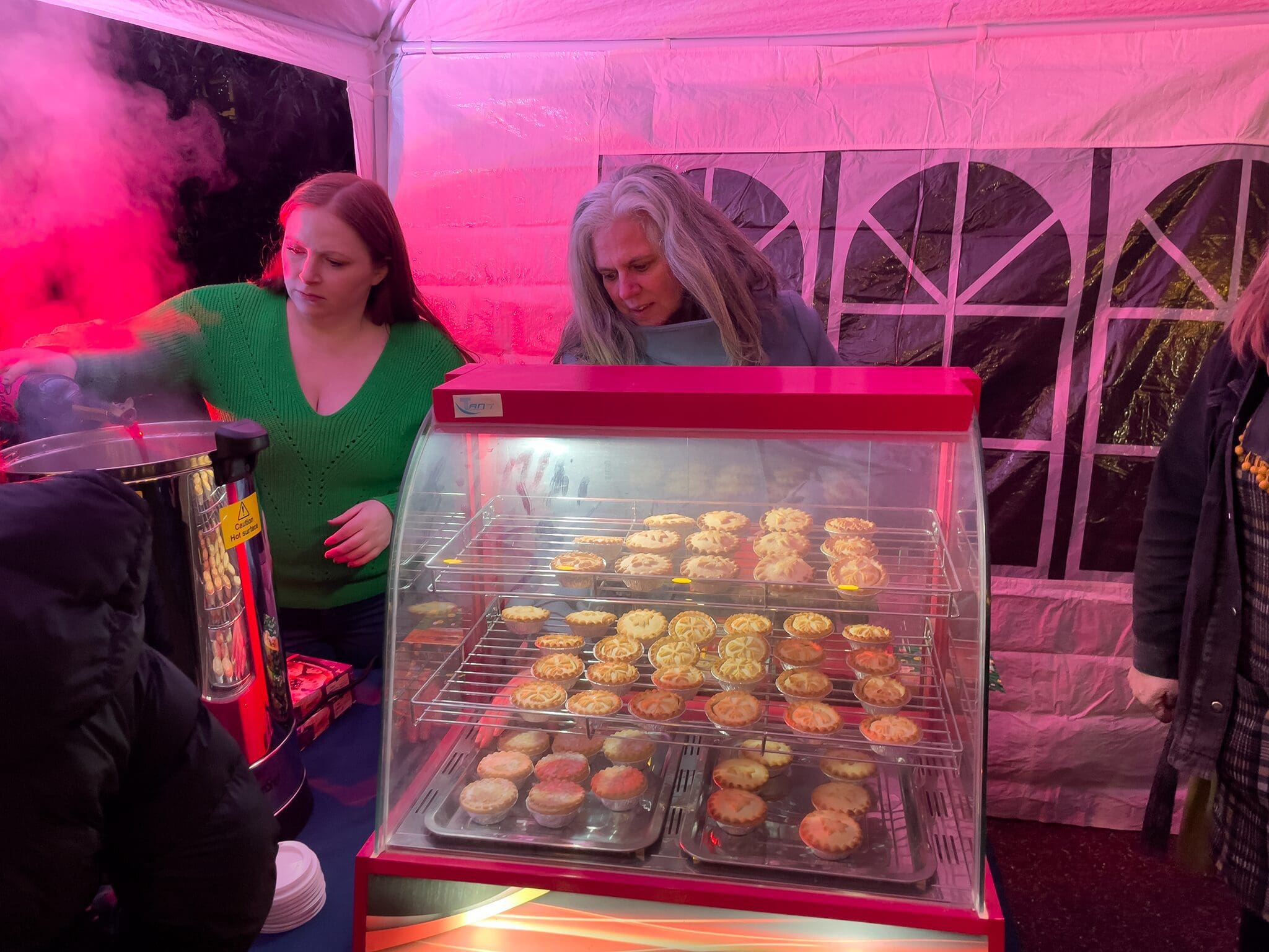 Leah, Trish and the mince pies at the Midhurst Christmas Street Party